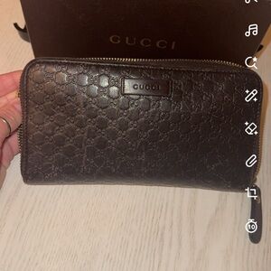 Gucci Dark Brown Embossed Leather Wallet